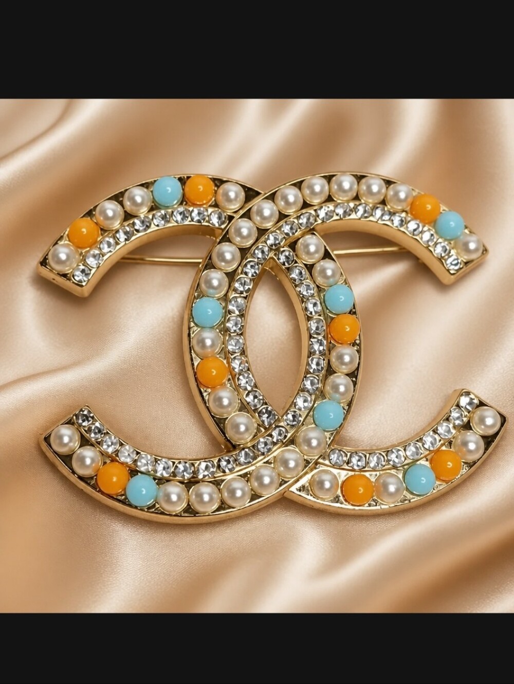 Gold Interlocking CC Brooch with Pearls and Turquoise-Blue & Orange Accents